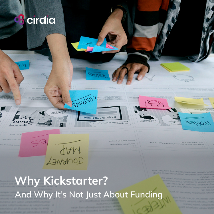 Cirdia team collaborating around a whiteboard with sticky notes and design sketches